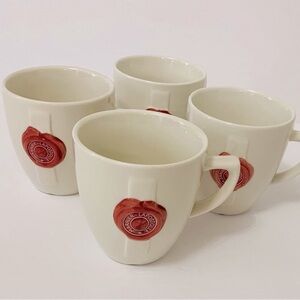 Set of Four Cream Collectible Grand Marnier Embossed Mugs, Great Condition
